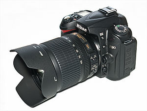 D90   Тип   Цифровая зеркальная фотокамера объективом   сенсор   Nikon DX   формат   23,6 × 15,8 мм КМОП Максимальная   разрешение   4288 × 2848 [L], 3216 × 2136 [M], 2144 × 1424 [S] (12,3 миллиона пикселей)   Тип объектива   крепления   F-Mount Nikon   (С сообщением и контактами АФ)   затвор   Вертикальный затвор в фокальной плоскости с электронным управлением Диапазон   выдержек   от 30 до 1/4000 секунд Замер   экспозиции   Матричный цветной 3D-матричный замер II, цветной матричный замер II, центрально, точечный, Режимы съемки: автоматический, приоритет диафрагмы, приоритет выдержки, ручной, программный автоматический, сюжетный Типы замера TTL с помощью 420-пиксельного датчика RGB Зоны фокусировки 11 точек фокусировки ( в том числе 1 датчик перекрестного типа) Режимы фокусировки однозонное, с динамическим выбором зоны, с автоматическим выбором зоны, 3D-отслеживание (11 точек) Серийная съемка 4